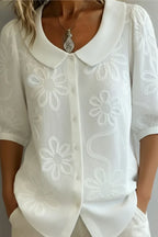 Marisa | Blusa con cuello de flores