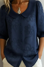 Marisa | Blusa con cuello de flores